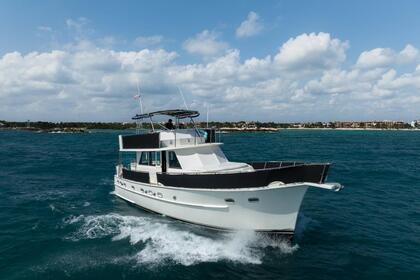 Alquiler Yate a motor Hatteras 58 Puerto Aventuras