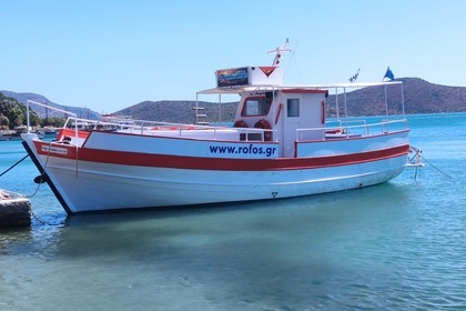 Hire Motorboat Wooden Wooden motorboat Elounda