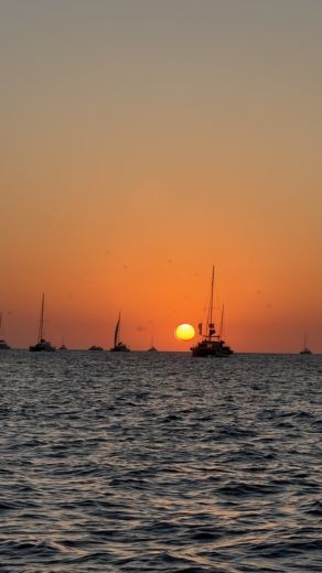 Santorini Without license SANTORINI BLACK BOAT alt tag text